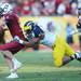 Michigan defensive tackle Jibreel Black attempts to and misses a tackle on South Carolina quarterback Connor Shaw during the fourth quarter of the Outback Bowl at Raymond James Stadium in Tampa, Fla. on Tuesday, Jan. 1. Melanie Maxwell I AnnArbor.com